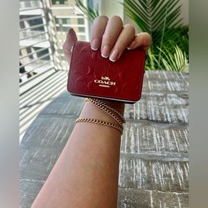 Coach mini wallet on a chain